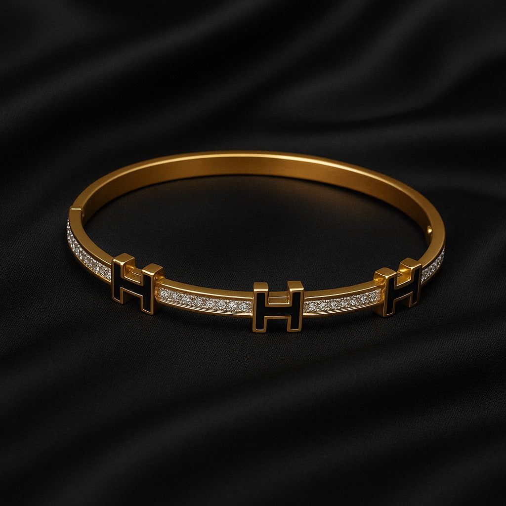 Luxury Gold-Plated “H” Designer Bangle with Black Enamel & Micro-Stone Detailing