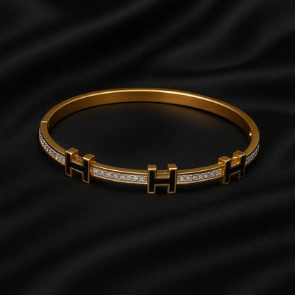 Luxury Gold-Plated “H” Designer Bangle with Black Enamel & Micro-Stone Detailing