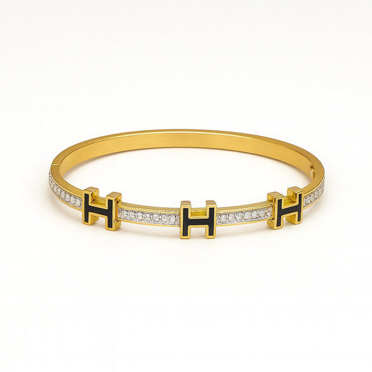 Luxury Gold-Plated “H” Designer Bangle with Black Enamel & Micro-Stone Detailing